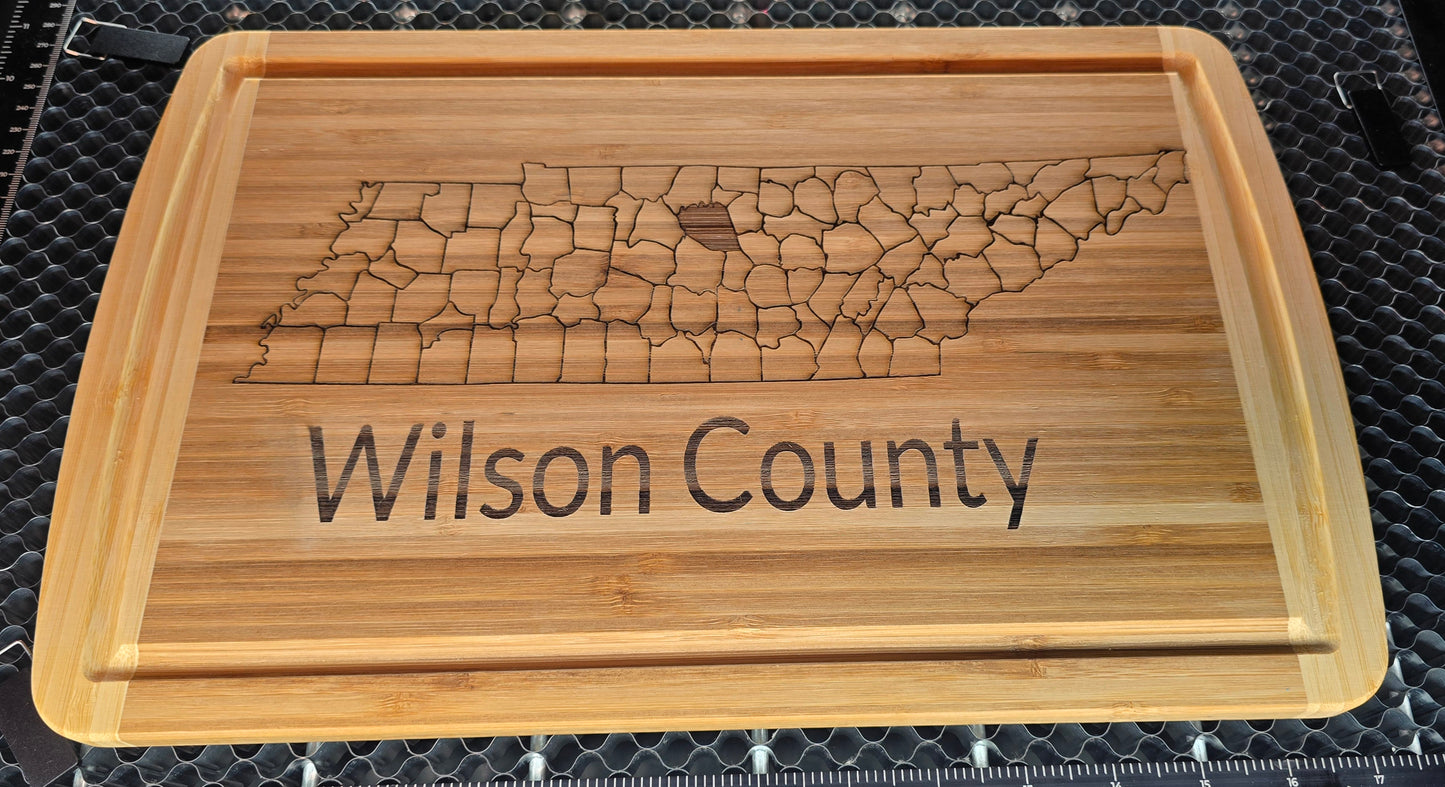 Cutting boards,  with County and State.