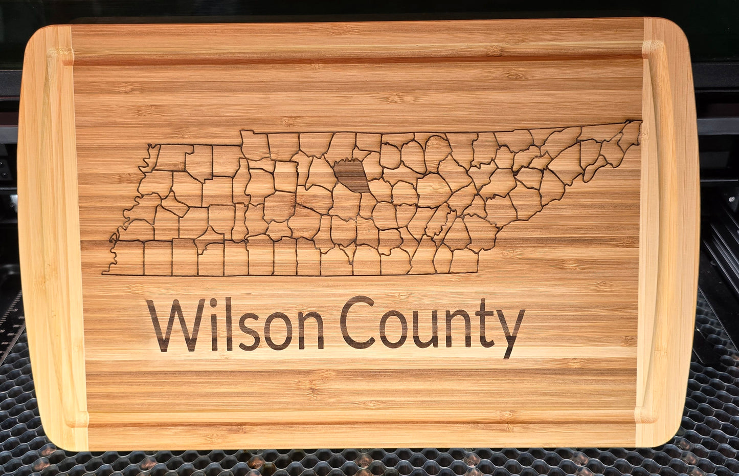 Cutting boards,  with County and State.