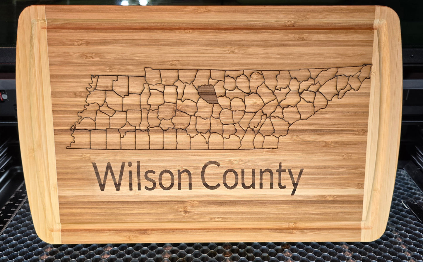 Cutting boards,  with County and State.