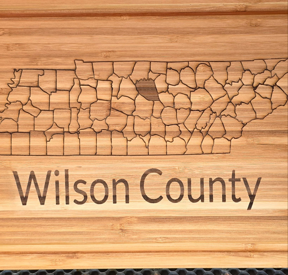 Cutting boards,  with County and State.